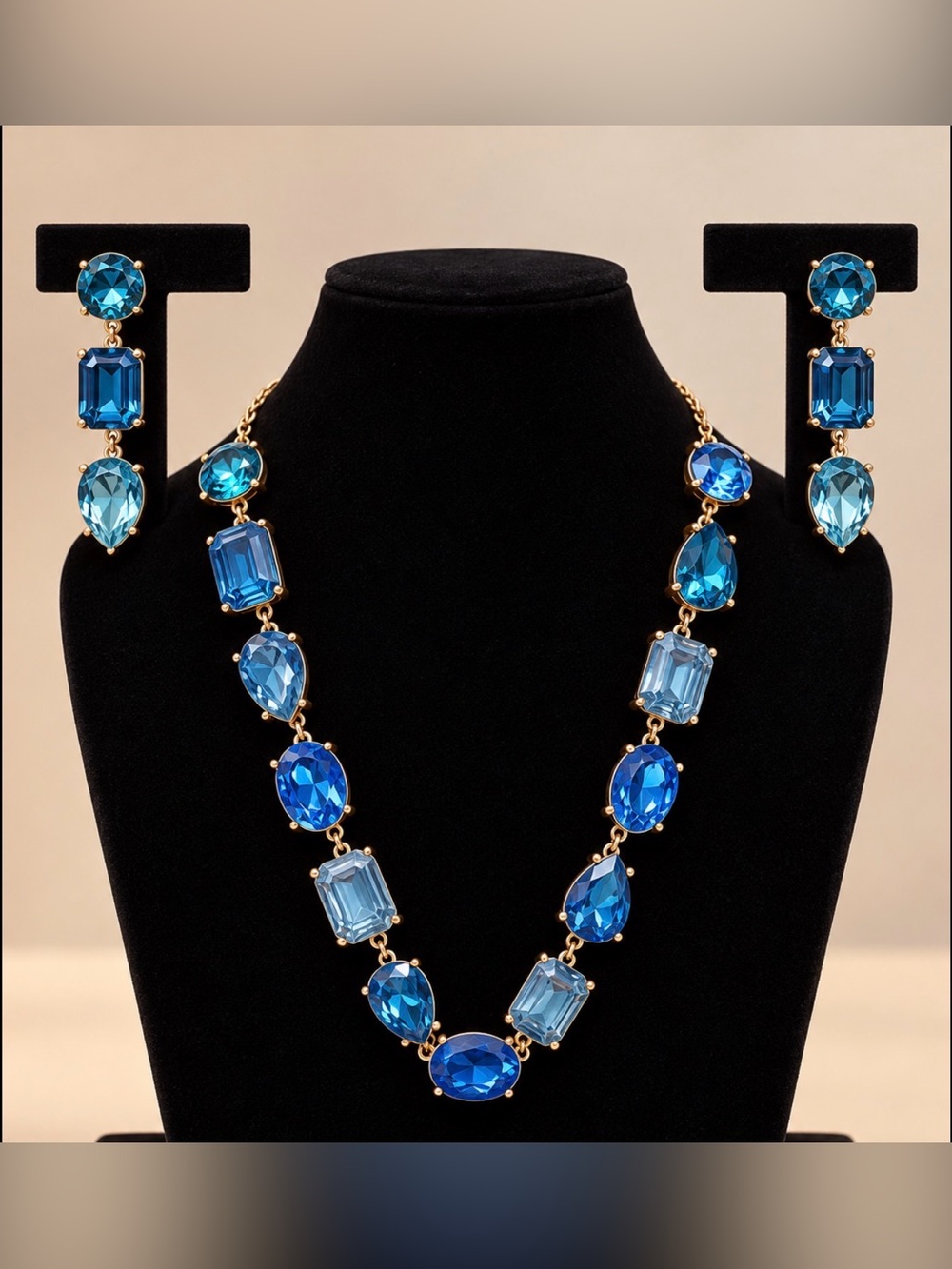 TWO PIECE, BRAND NEW set of a blue crystal necklace 18k gold plated & earrings.